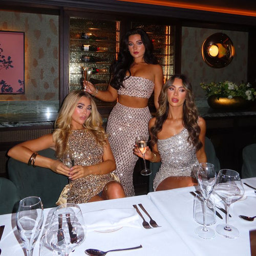 Women's sparkly outfits in gold, silver and rose gold. Fully embellished with sparkly sequins. 