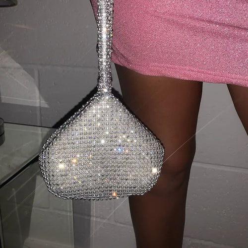 Women's silver diamante bag which is fully embellished with diamantes.