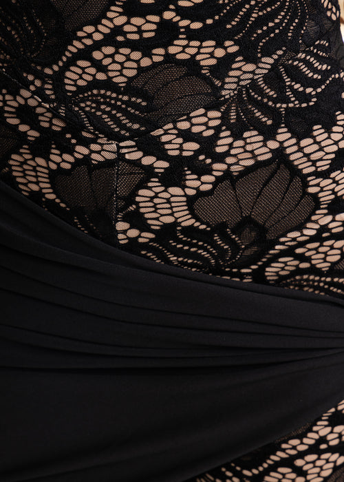 Close up detail of black lace fabric swatch