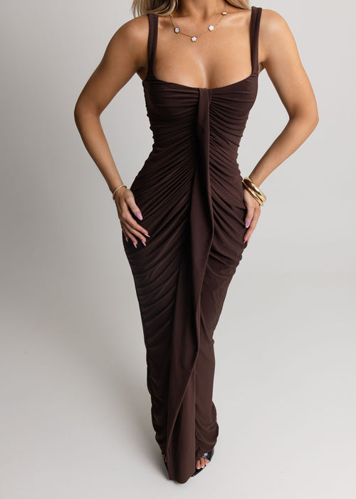 Women's chocolate brown maxi dress with ruching down the centre of dress and figure hugging fit. Model is 5ft7' and wears a size S 8
