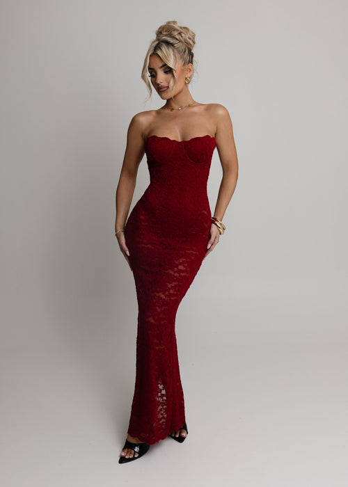 Women's wine lace maxi dress with strapless neckline, built in balconette cups and sheer lace skirt. 