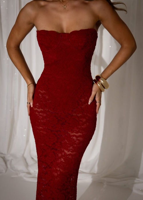 Women's wine lace maxi dress with strapless neckline, built in balconette cups and sheer lace skirt. 