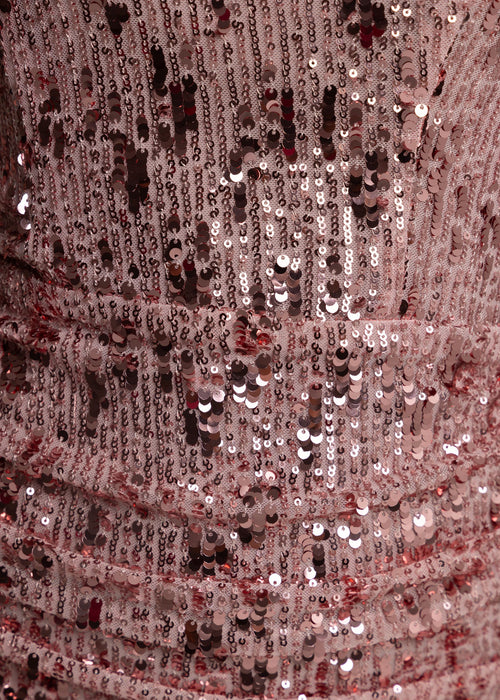 Women's pink sequin mini dress with detachable sleeves so dress can be worn two different ways, with sleeves or strapless. Fully embellished with pink sparkly sequins and mesh pink sleeves.  Model is 5ft2' and wears a size XS 6/